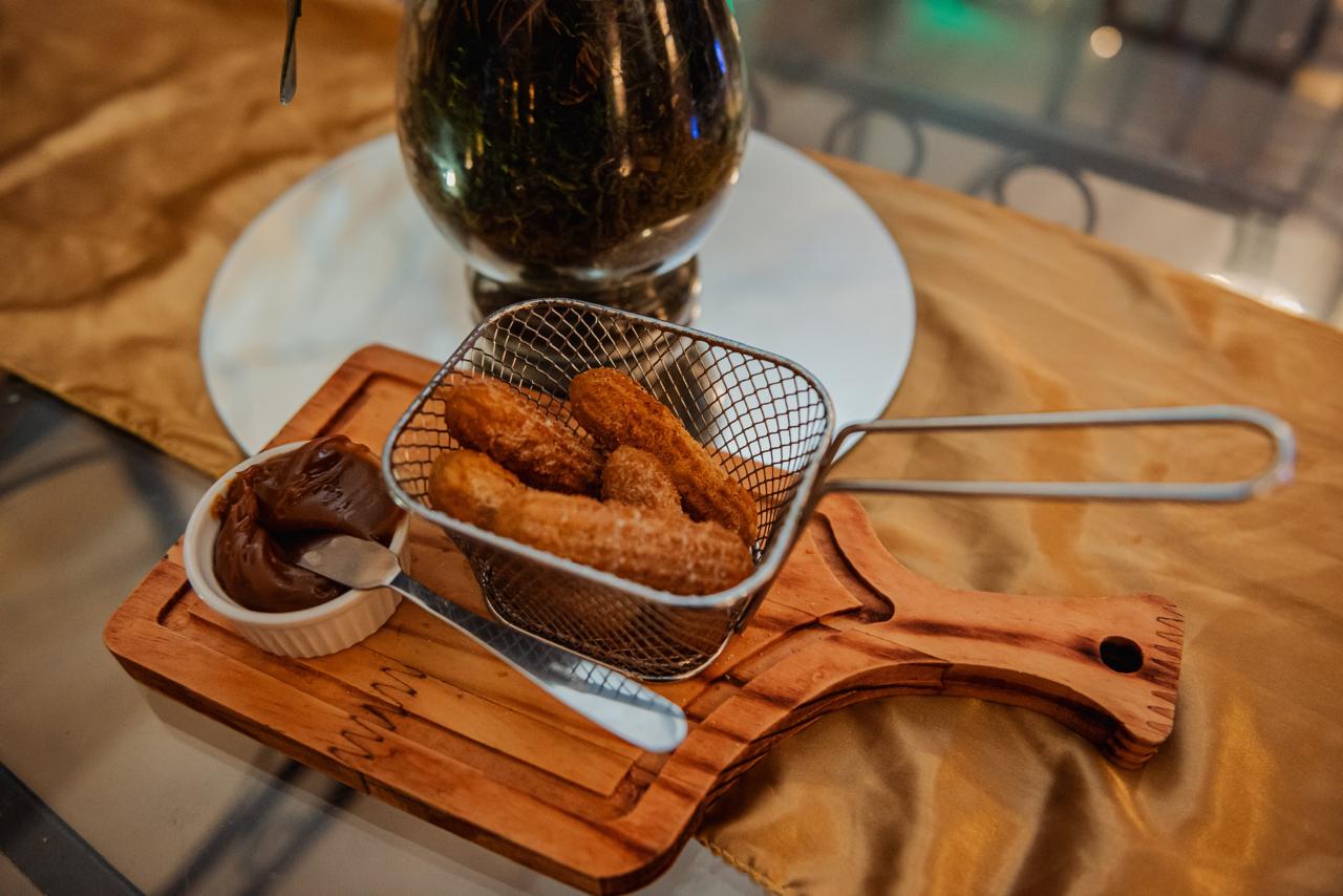 Churros com doce de leite servidos como finger food no Buffet Dream Hall